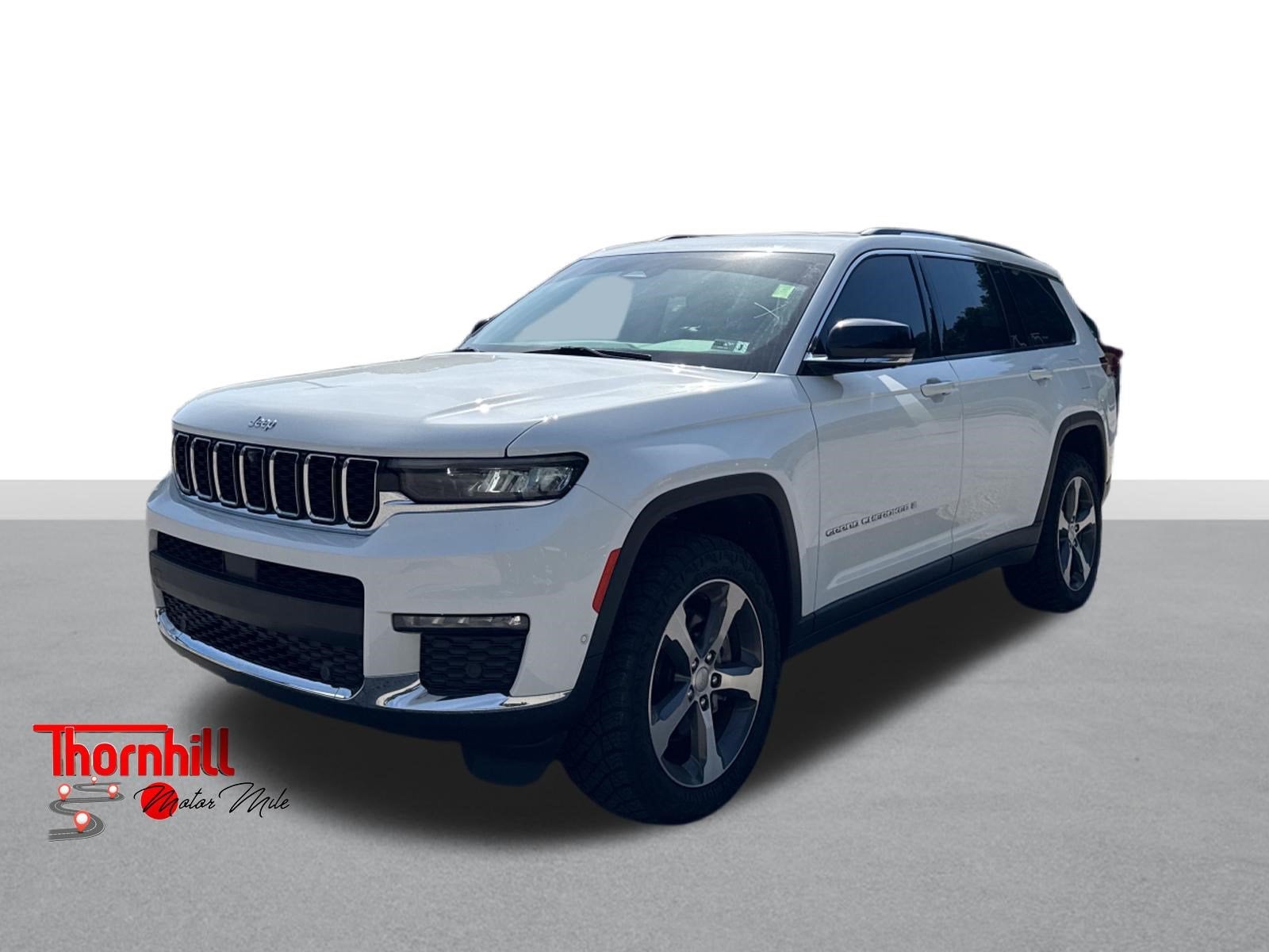 2023 Jeep Grand Cherokee L Limited in White — front three-quarter view