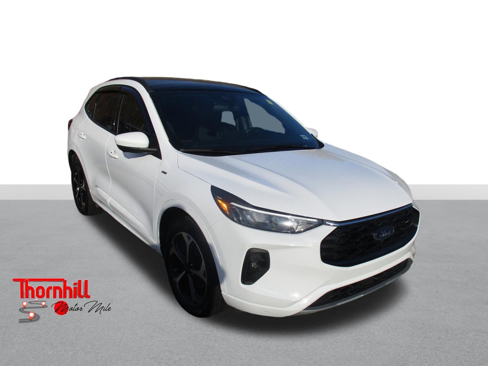 2023 Ford Escape ST-Line Select in Oxford White — front three-quarter view