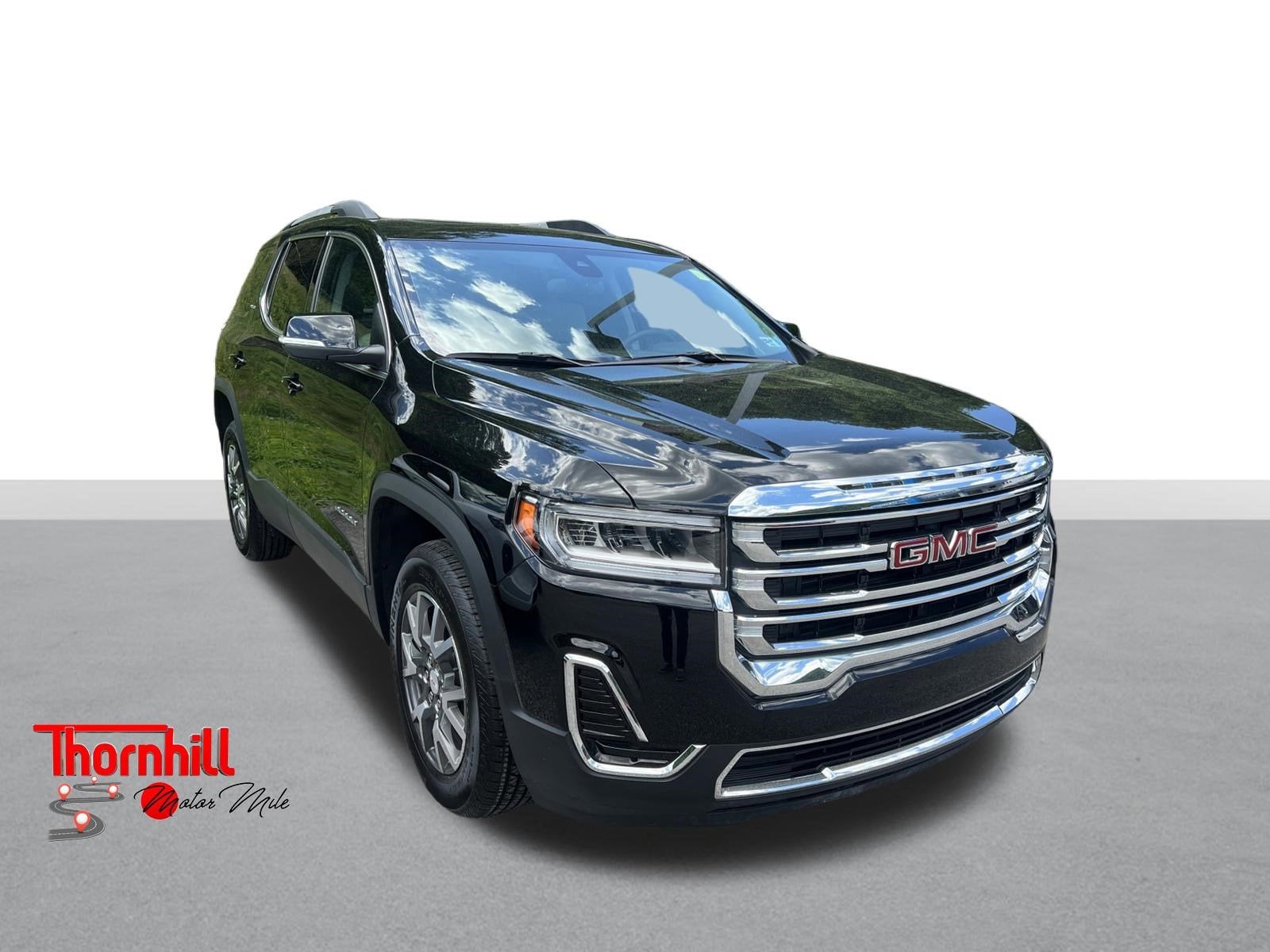 2023 GMC Acadia SLE in Ebony Twilight Metallic — front three-quarter view