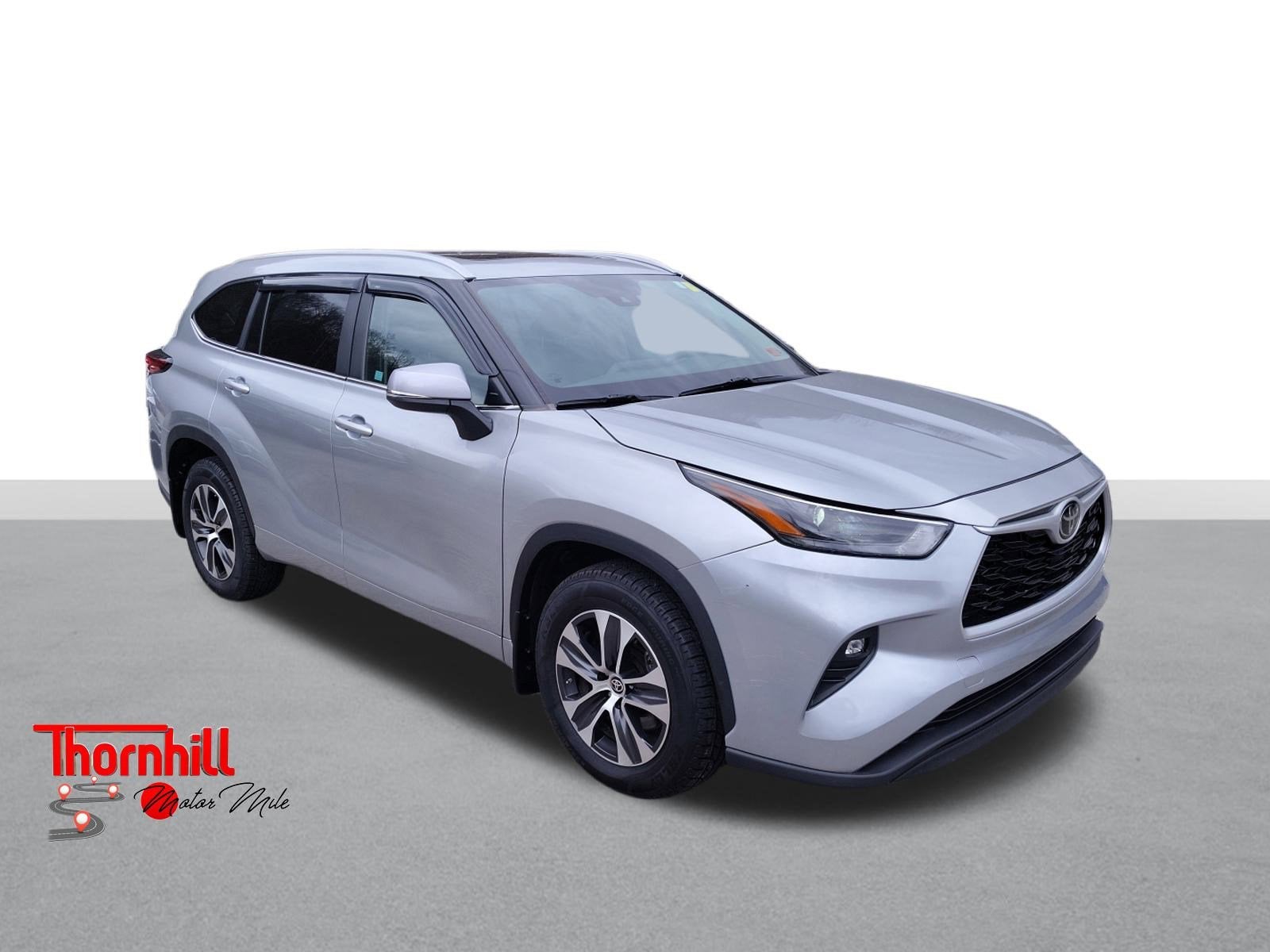2023 Toyota Highlander L in Silver — front three-quarter view